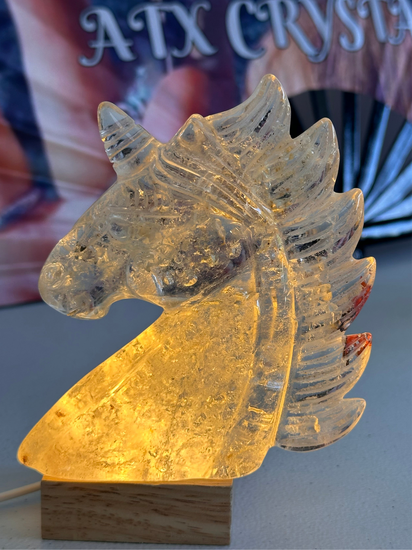 Unicorn Carving with Hematoid Inclusions and Rainbows