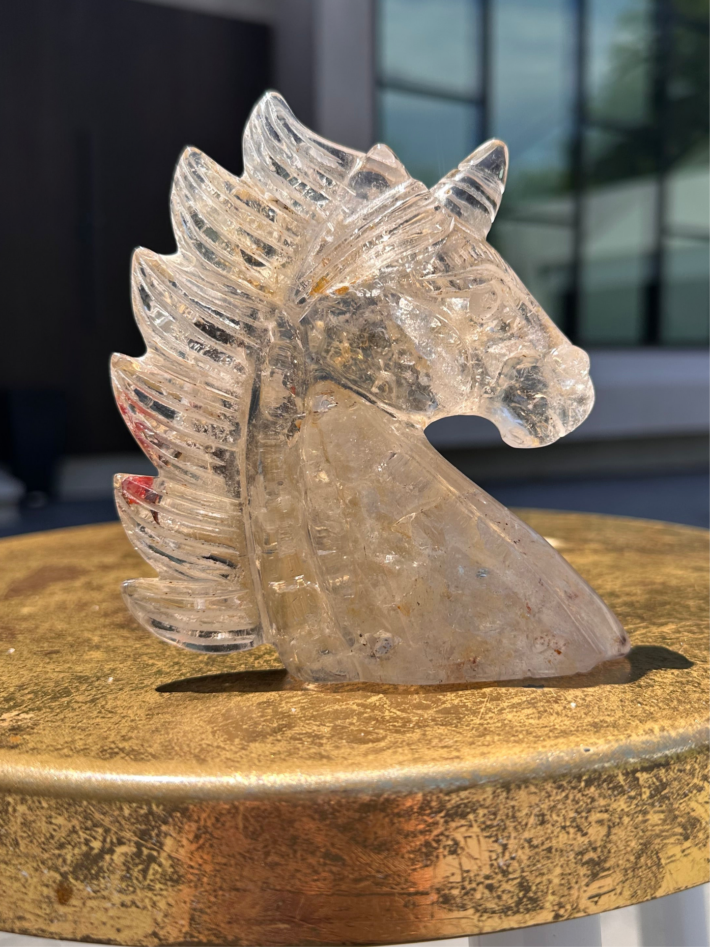Unicorn Carving with Hematoid Inclusions and Rainbows