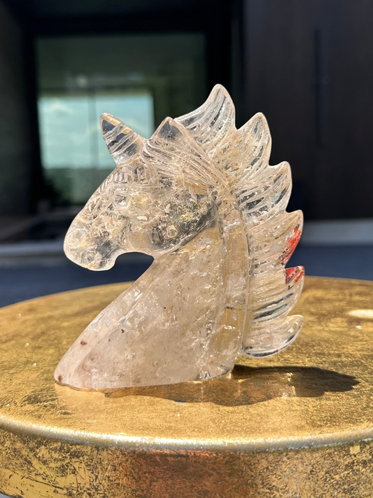 Unicorn Carving with Hematoid Inclusions and Rainbows