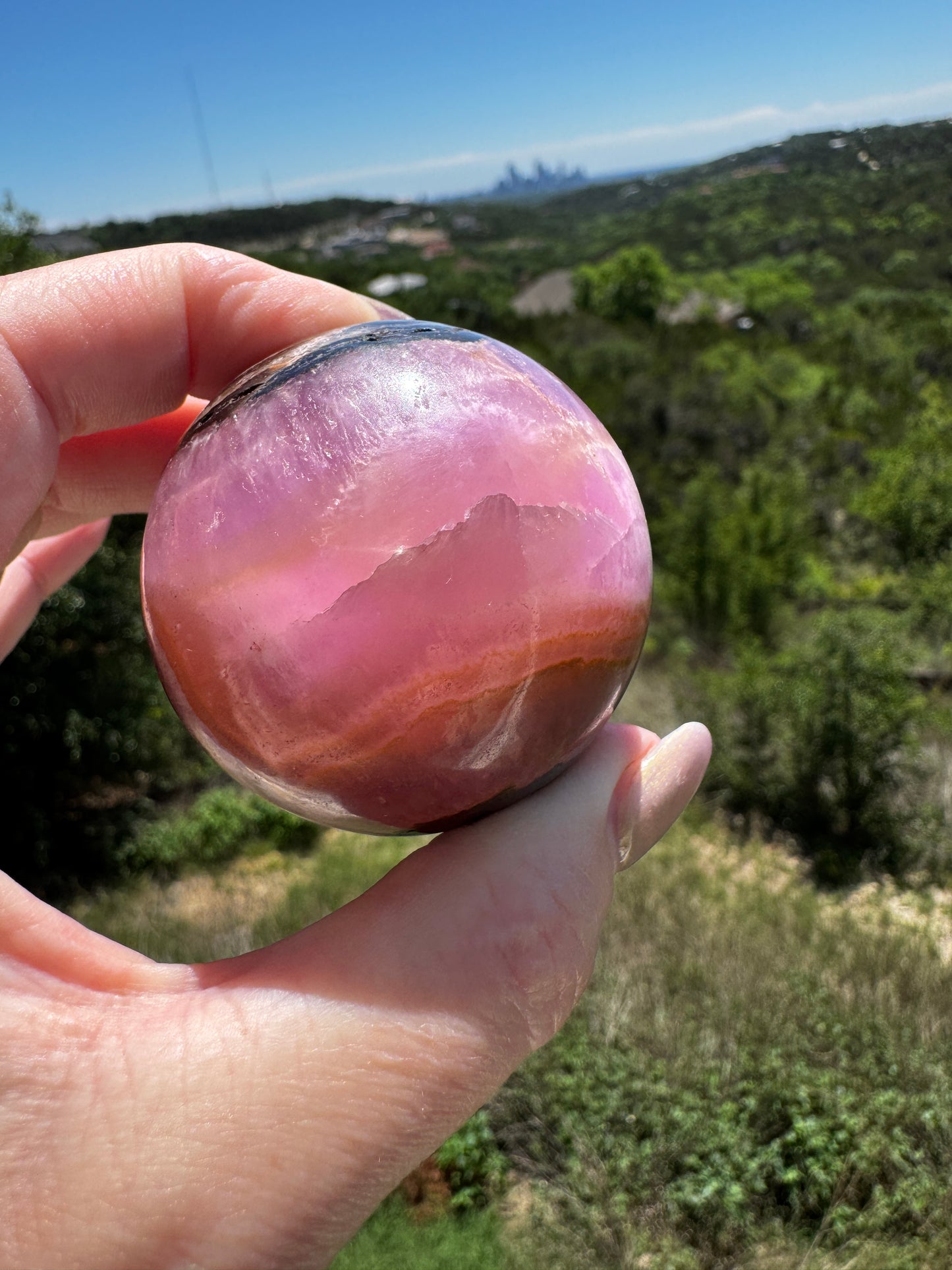 Glowing Shades of Pink and Orange Aragonite & Magnetite Sphere 214 Gram Sphere